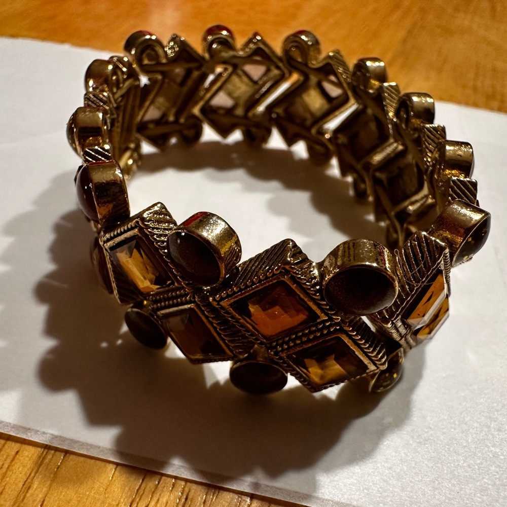 Gold tone Bracelet with Brown  and gold color Details